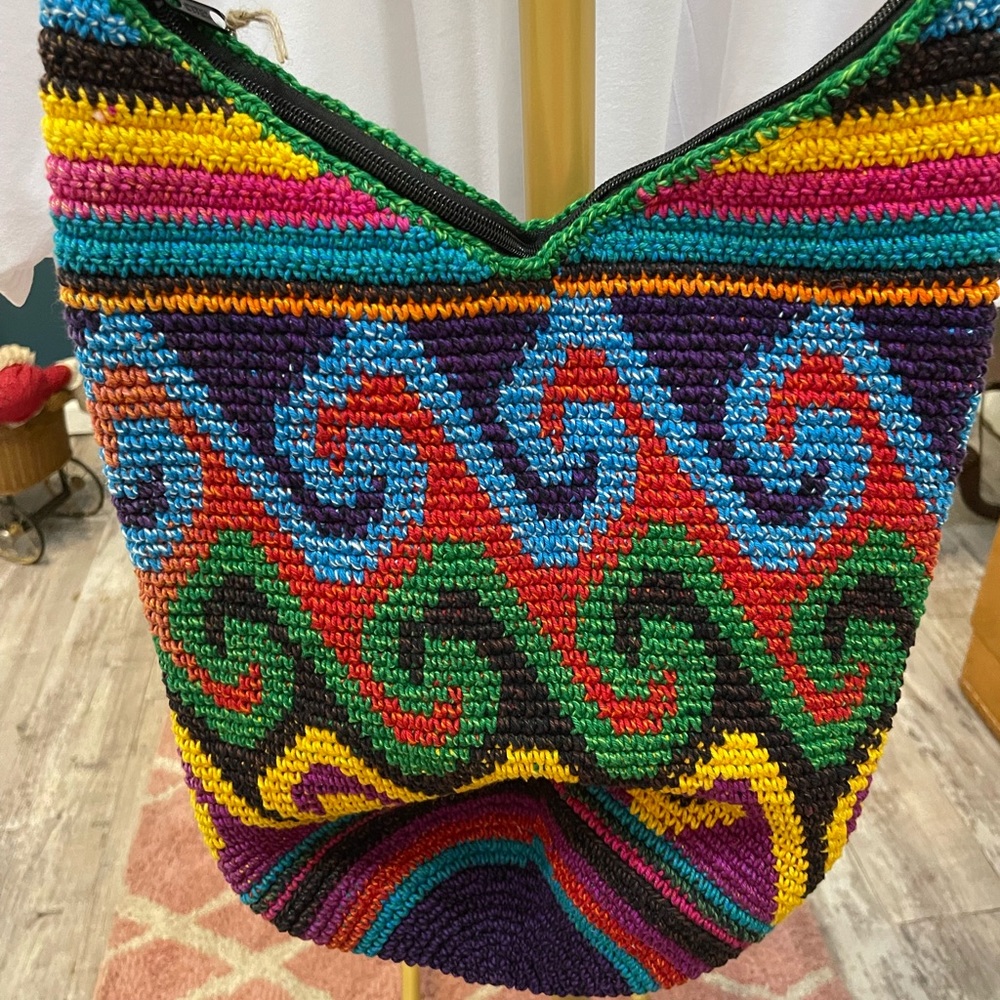 You’ll love this multicolored purse heavy material